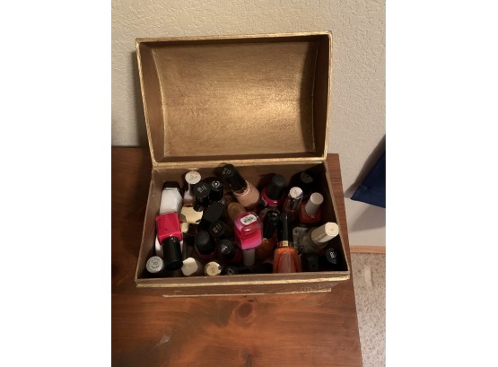 Gold Cardboard Box Full Of Nail Polish