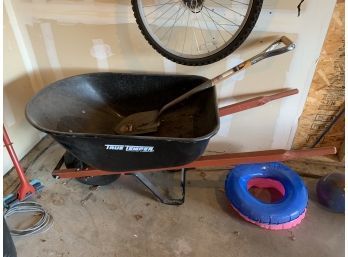 Wheelbarrow And Shovel