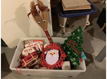 Assortment Of Christmas Decorations In Plastic Tub