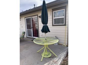 Yellow Metal Patio Table With Umbrella Stand And Umbrella