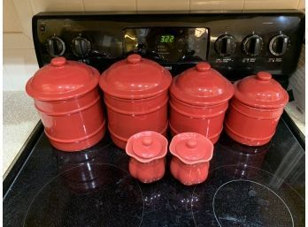 Red Canisters And Candles