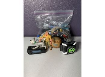 Toy Assortment - Lego Pieces, Baseball, And Happy Meal Toys