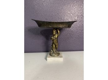 Trinket Dish / Small Platter Atop A Figure Of A Young Child On A Marble Base