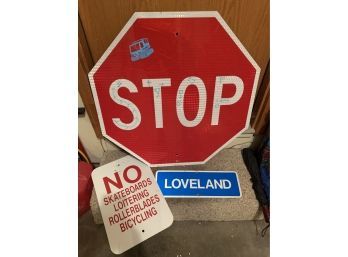 Stop Sign, Loveland Sign And No Skateboarding... Sign