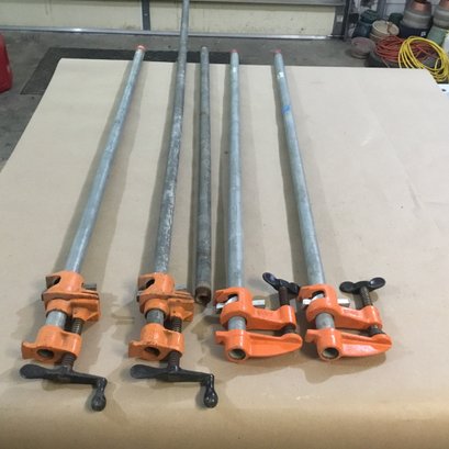 4 Pipe Clamps And 1 Extra Long Pipe