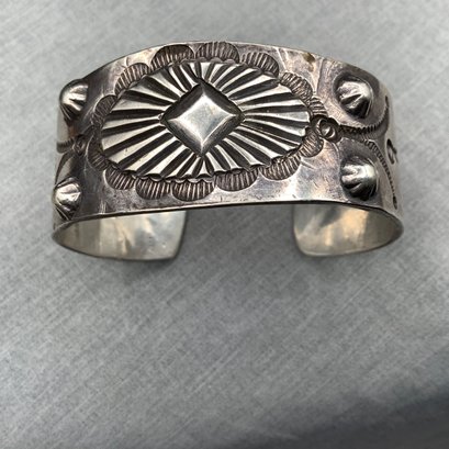 Silver Artisan Made Repousse Wide Cuff Bracelet With Center Concho Pattern
