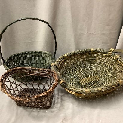 3 Baskets In Tones Of Dark Olive, One Has Wooden Handles
