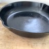 Number Eight Cast Iron Fry Pan With Heat Ring And Double Pour Spots.  11 1/8 Inch Diameter, 2 1/4 Inch Depth.