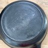 Number Eight Cast Iron Fry Pan With Heat Ring And Double Pour Spots.  11 1/8 Inch Diameter, 2 1/4 Inch Depth.
