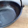 3 Footed Cooking Cast Iron Caldron With Hangar Handle. 10 3/4 Diameter, 3 1/8 Depth