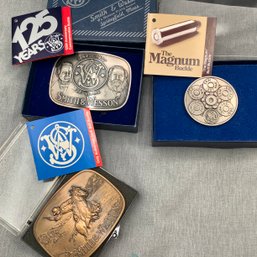 3 Smith & Wesson Belt Buckles, Including The Magnum Buckle, 125 Year Buckle - All With Cases