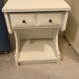 Cute White End Table With Cut Out Decorative Sides Of Base, One Drawer