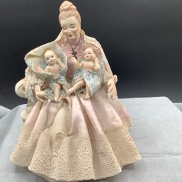 Extremely Delicate Women With Babies With Porcelain Lace