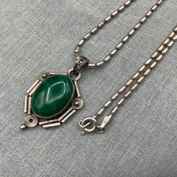 Sterling Silver Chain With Handmade Pendant With Malachite Cabochon Surrounded By Rods And Coils