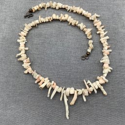 White Strand Coral Necklace In Varying Sizes Strung On 19 Inch Long Necklace