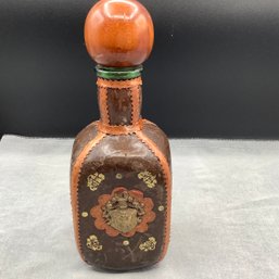 Leather Decanter Bottle, Made In Italy, Has Stopper And Metal Crest On Side