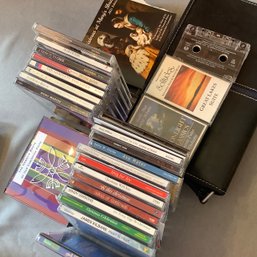 CDs And A CD Zipper Case, 3 Cassette Tapes Too