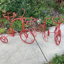 3 Red Metal Wire Garden Planters In Shape Of Tricycles