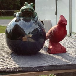 Frog On A Gazing Ball And Concrete Heavy Cardinal