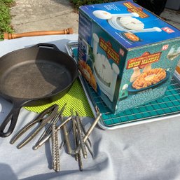 Lodge Cast Iron Skillet, Cookie Sheet, Silicone Mat, Cooling Rack, Onion Machine And Nut Cracker Set