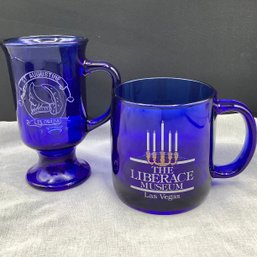 Blue Souvenir Glasses From St Augustine, FL And The Liberace Museum In Las Vegas