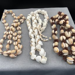 3 Shell Necklaces, One Appleseed And Cowrie Shells, One Cowrie Shells, One White Seashells