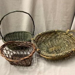 3 Baskets In Tones Of Dark Olive, One Has Wooden Handles