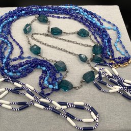 4 Costume Necklaces, 2 Matching Blue And White Nautical, One With Teal Rocks & One Multistrand