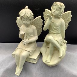 Pair Of Resin Angel Sculptures