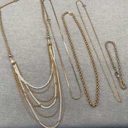 4 Costume Necklaces And One Bracelet