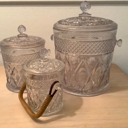 3 Graduated Glass Jars With Lids, Small One Has Wicker Handle