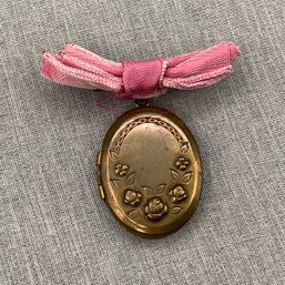 Vintage Locket With Repouss Roses- Locket Bale Is On A Pin With Pink Tied Ribbon