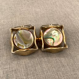 Destino Cufflinks With Abalone Center In A Circular Bezel Inside A Wavy Bordered Square