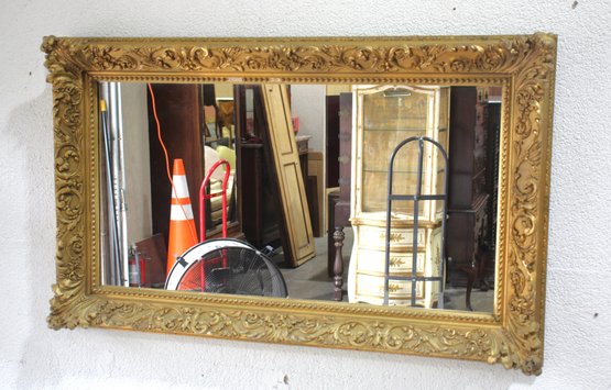 Ornate Vintage Giltwood Mirror With Intricate Detailing