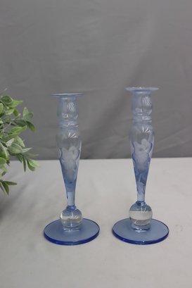 A Pair Of Ultramarine And Embossed Flower Baluster Candlesticks