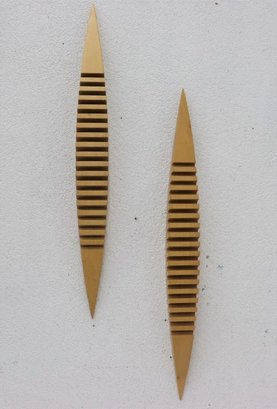 Two Grooved Tapered Wooden Wall Art Pieces