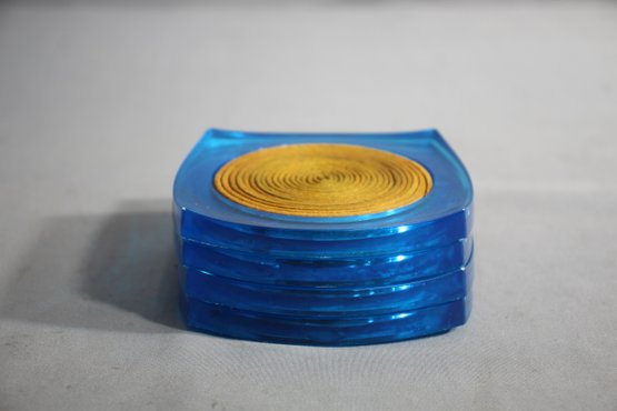 Set Of Four Mid Century Modern Blue Plastic Coasters USA