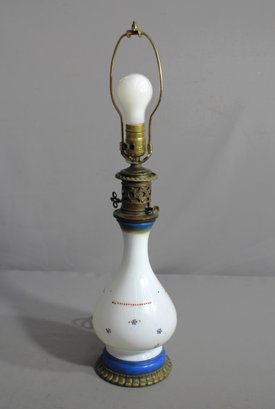 Antique Elegance: Hand-Painted Blue And White Oil Lamp With Floral Accents'