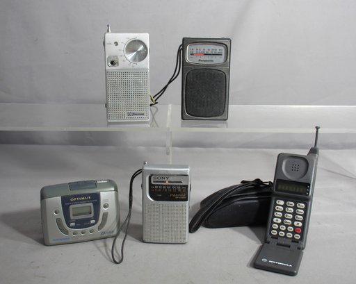 Retro Electronics Ensemble: Radios And Iconic Flip Phone