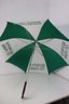 Two Faux Bamboo Handle Umbrellas And A Belmont Park Umbrella