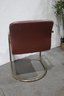 Tubular Steel Cantilever U Base Chair With Distressed Leather