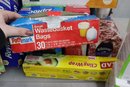 Group Lot Of Plastic Wrap And Bags, Trash Bags, Heating Pad And More