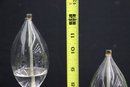 Two Glass Tulip Bulb Shaped Stemmed Oil Lamps