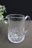 Two Cut Clear Crystal Pitchers, One Is Marked Waterford