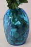 Artificial Lilies And Blue Roses In Blue Dimple Glass Vase