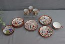 Group Lot Of Geisha Girl Small Plates And Cups -(one Plate And Cup Are Chip)
