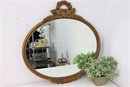 Rosette And Wheat Sheaf Crowned Gilded Oval Wall Mirror