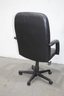 Black Executive Desk Chair On Asterisk Wheeled Base