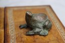 Faux Wooden Book With Frog Figurine On Top