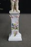 Three Hand Painted Porcelain Figurines On Floral Plinth Pedestals - Young Bacchus And Friends
